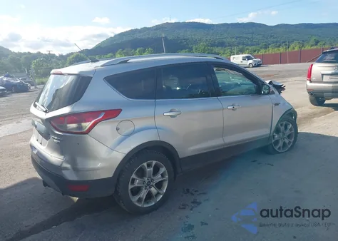 2014 Ford Escape Titanium z USA, uszkodzony, nr VIN 1FMCU9J92EUA53779